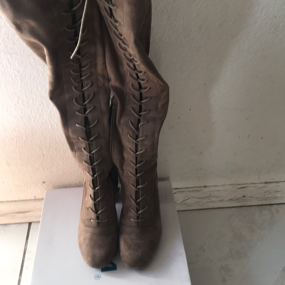 High heel lace up boots